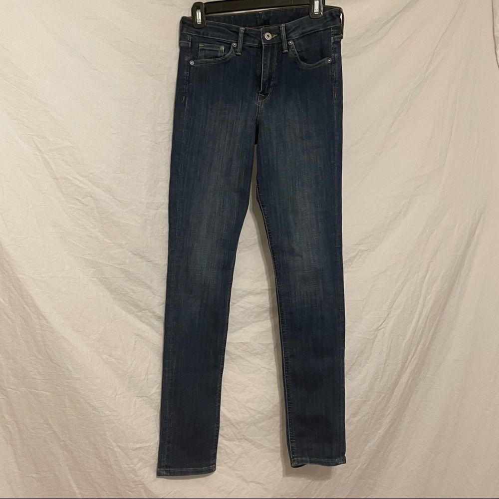 DARK WASHED UNRIPPED JEANS